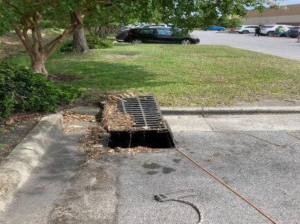 Catch basin with debris
